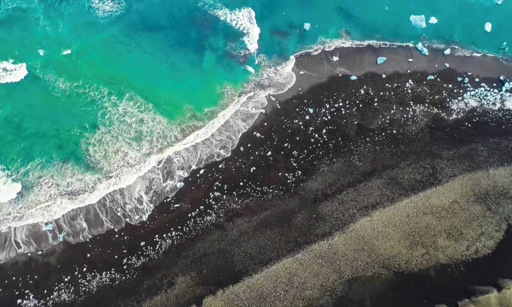 dark sand beach